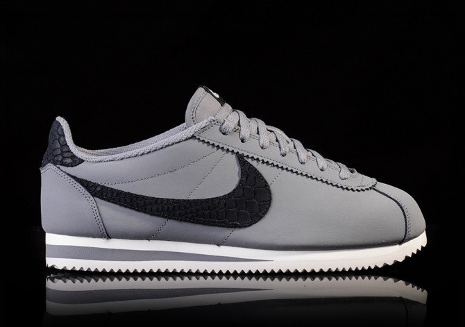 gray and black nike cortez